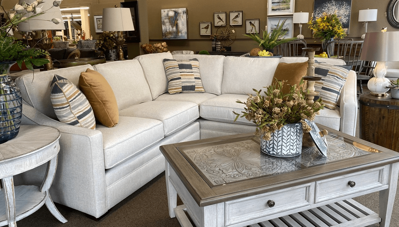 white sectional and coffee table